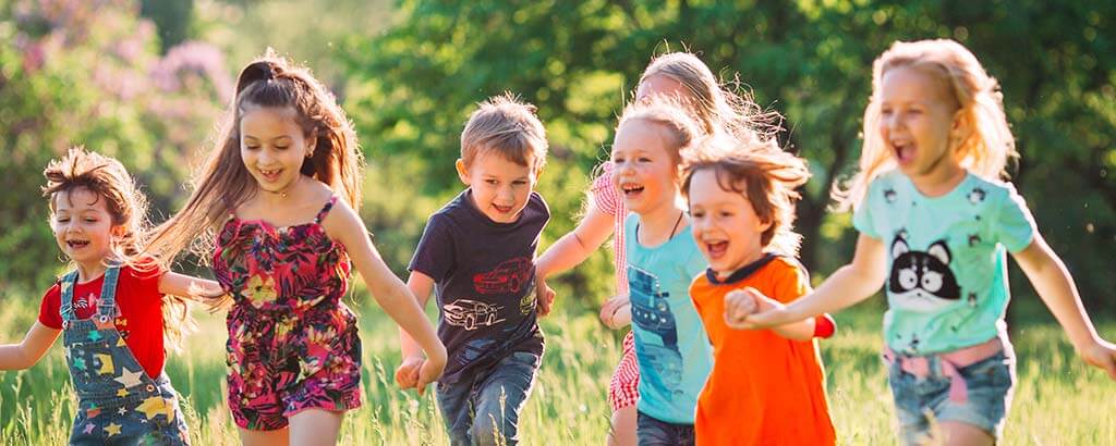 a group of children go play after getting dental sealants