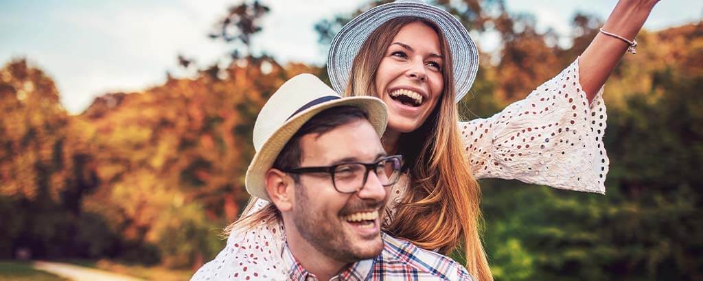 a man and woman consider gum contouring and reshaping