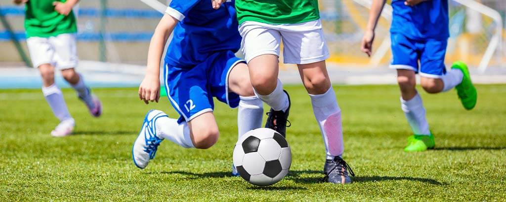 before a child receives traumatic injuries to his teeth he and his friends play soccer