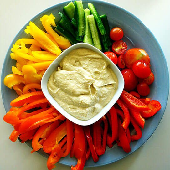 healthy game day snacks lay on a blue plate