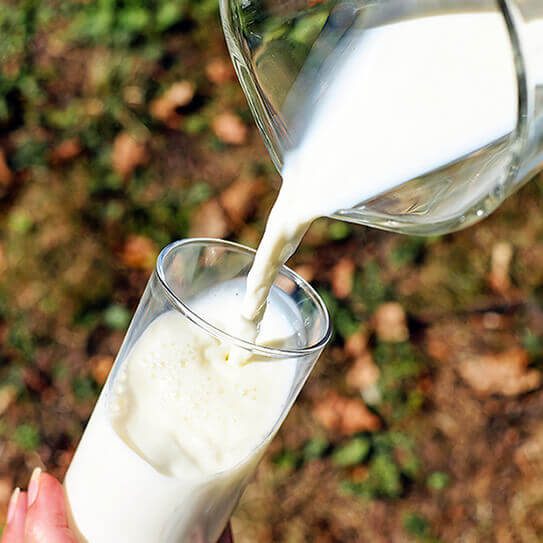milk in a glass is one way to take care of your tooth enamel